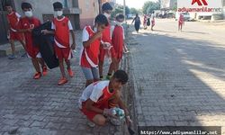 Şambayat Beldesi'nde sokak ve caddeleri sporcular temizledi
