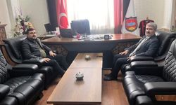 Besni Belediye Başkanı Reşit Alkan'dan Ferhat Songur'a tebrik ziyareti