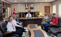 Besnili şampiyon sporculardan Kaymakam Aslan'a ziyaret
