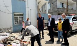 Başkan Hallaç yangın mağduru aileyi yalnız bırakmadı