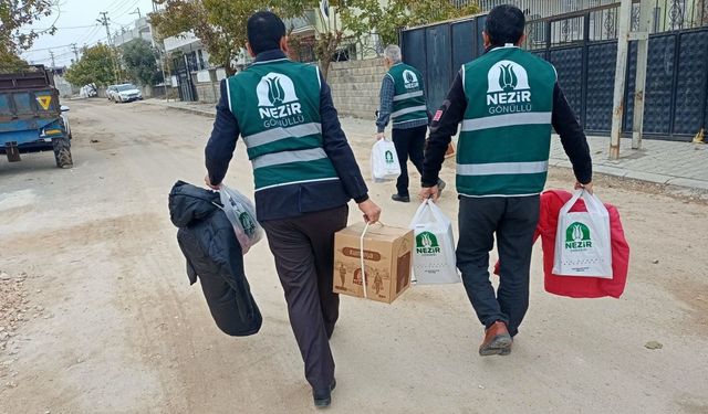 Adıyaman'da Nezir Derneği’nden kış desteği: Konteyner ve hanelere giyim yardımı