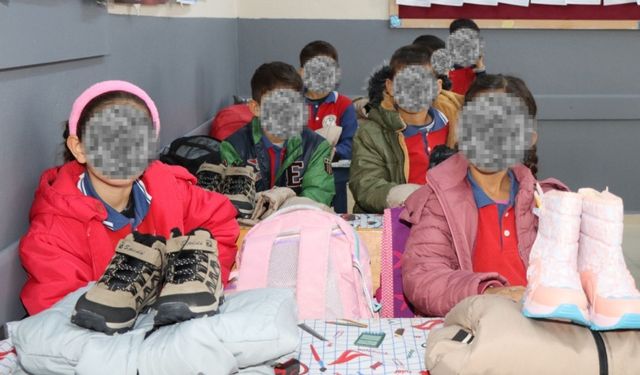 GTÜ öğrencilerinden Kahta'da 400 öğrenciye mont ve bot desteği