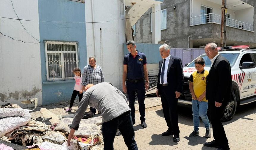 Başkan Hallaç yangın mağduru aileyi yalnız bırakmadı